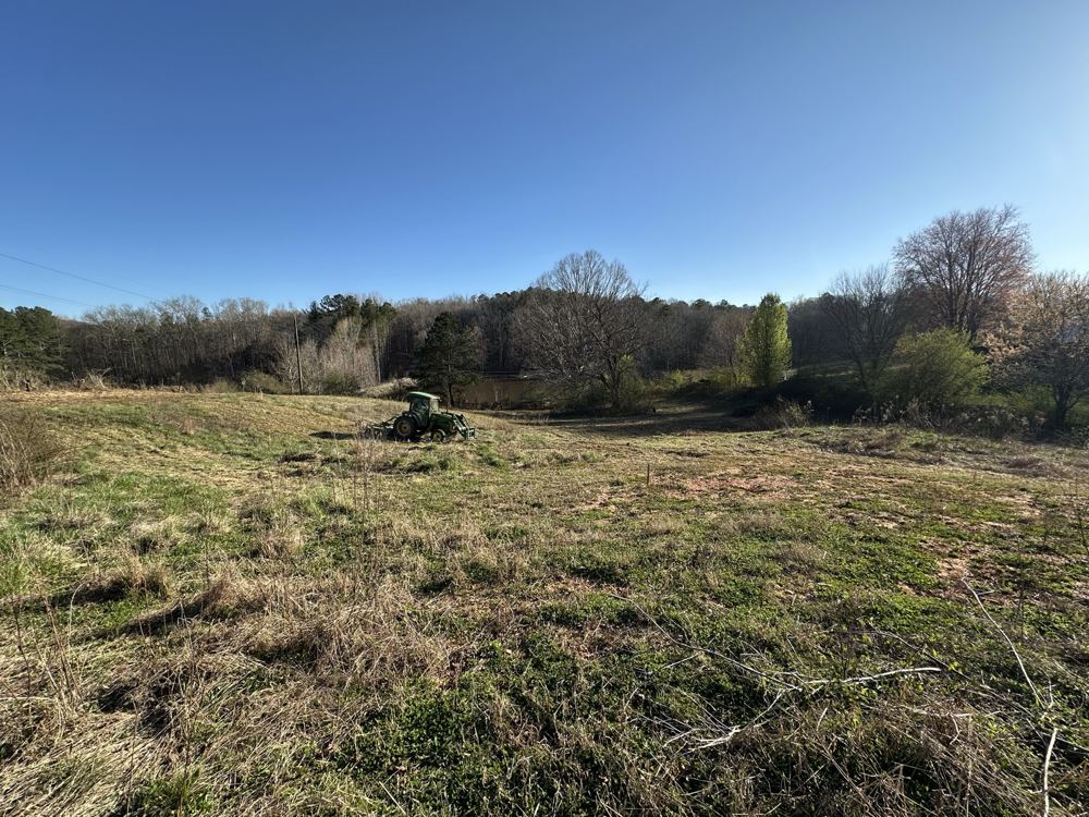 Bush-hogging a field by Vaughn Lyle Contracting in West Georgia